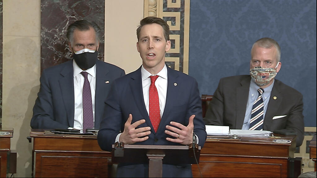 FILE - In this image from video, Sen. Josh Hawley, R-Mo., speaks as the Senate reconvenes to debate the objection to confirm the Electoral College Vote from Arizona, after protesters stormed into the U.S. Capitol on Jan. 6, 2021. (Senate Television via AP, File)