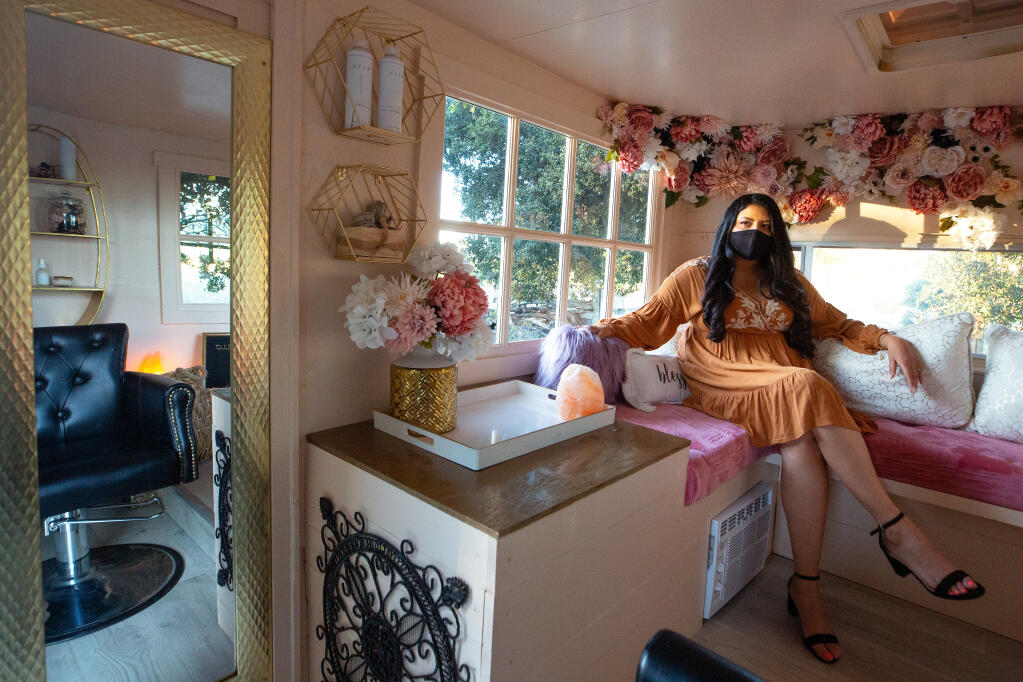 Celeste Gonzalez converted a camper into a mobile salon in order to keep her business afloat during the COVID-19 pandemic, in Petaluma, California, on Tuesday, Dec. 1, 2020. (Alvin A.H. Jornada / The Press Democrat)