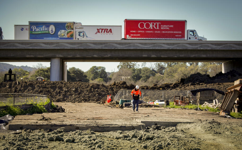 Construction continues beneath Highway 101 near Rainier Avenue on Wednesday, Feb. 16, 2022, in Petaluma. The Rainier crosstown connector has long been a source of political debate, and opponents are once again working to stop the project. (CRISSY PASCUAL/ARGUS-COURIER STAFF)