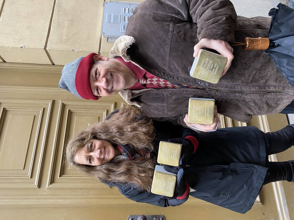 Renee Hawk of Rohnert Park and her brother Gregg Cohn of Mountain View hold the Stolpersteine that honor their father, uncle and grandparents in Görlitz, Germany. (Photographer: Amy Williams)
