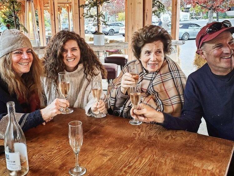 Lucille Gonnella, third from left, enjoys what would be her last toast at the Union Hotel on Nov. 25, 2020, with, from left, Barbara Gonnella, Gienna Michel Gonnella and Frank Gonnella, right. The four were celebrating the launch of the restaurant’s outdoor dining area, which Lucille watched Frank build from her bedroom window. (Gonnella family photo)