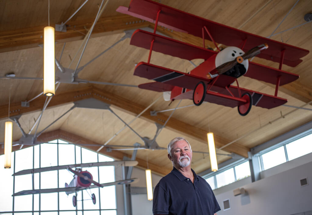 Tim Haworth spent months rehabbing the “Curse You Red Baron” planes originally built for the Sonoma County Fair Hall of Flowers display in 2007. The Sopwith Camel and Fokker Dr.I Triplane are now a central component of the new terminal at the Charles M. Schulz-Sonoma County Airport. (Chad Surmick / The Press Democrat)