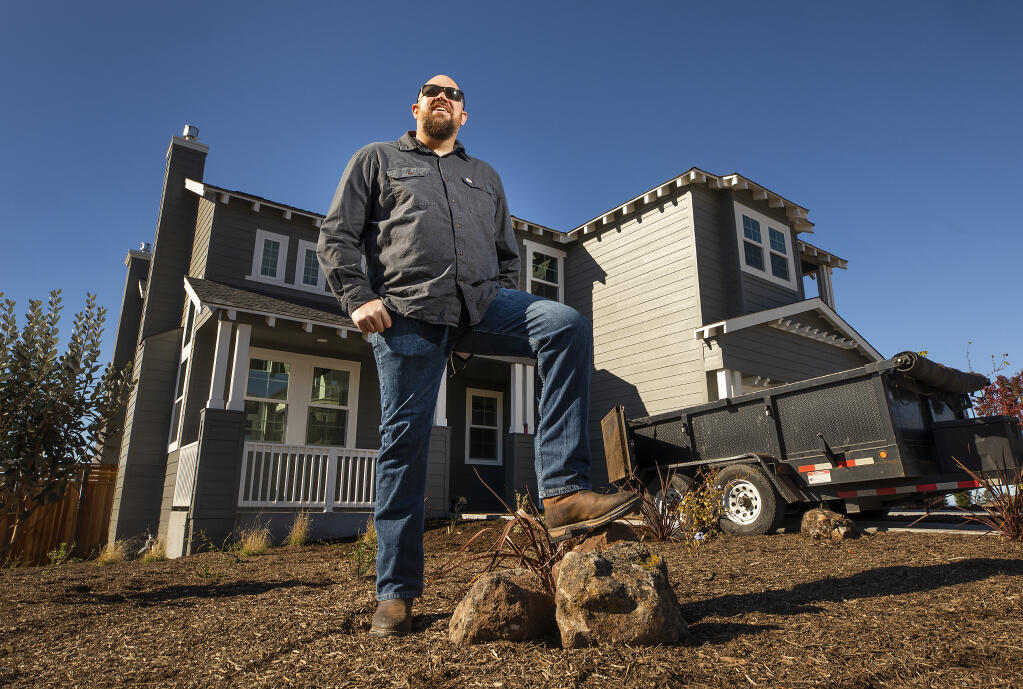 Jon Cromwell, head of construction at  Homebound, a fast-growing Santa Rosa construction company that has streamlined the building process through its cutting edge use of technology, stands in front of a nearly completed Homebound home in Fountaingrove.  (Photo by John Burgess/The Press Democrat)
