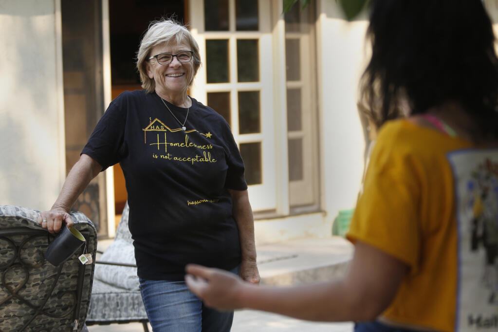 Annie Falandes, founder of Homeless Action Sonoma, talks with Shayla Finato on Thursday, August 19, 2021.(Beth Schlanker/The Press Democrat)