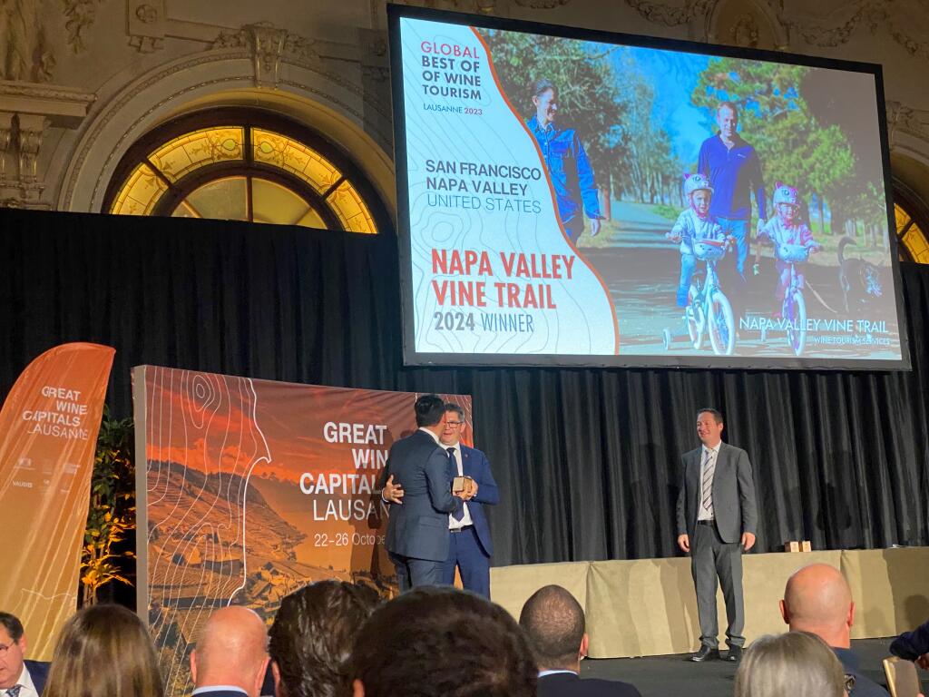The Napa Valley Vine Trail receives a Global Achievements in Wine Tourism award at the 2024 Best of Wine Tourism Awards Ceremony on Oct. 26, 2023 at Beau-Rivage Palace in Lausanne, Switzerland. (Napa Valley Vine Trail Coalition photo)