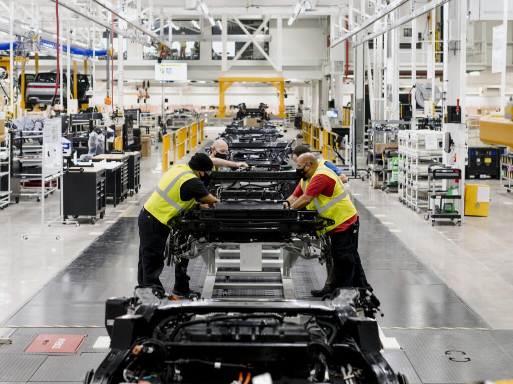 Workers at the Rivian factory in Normal, Ill., on Jan. 13. (Lyndon French/The New York Times)
