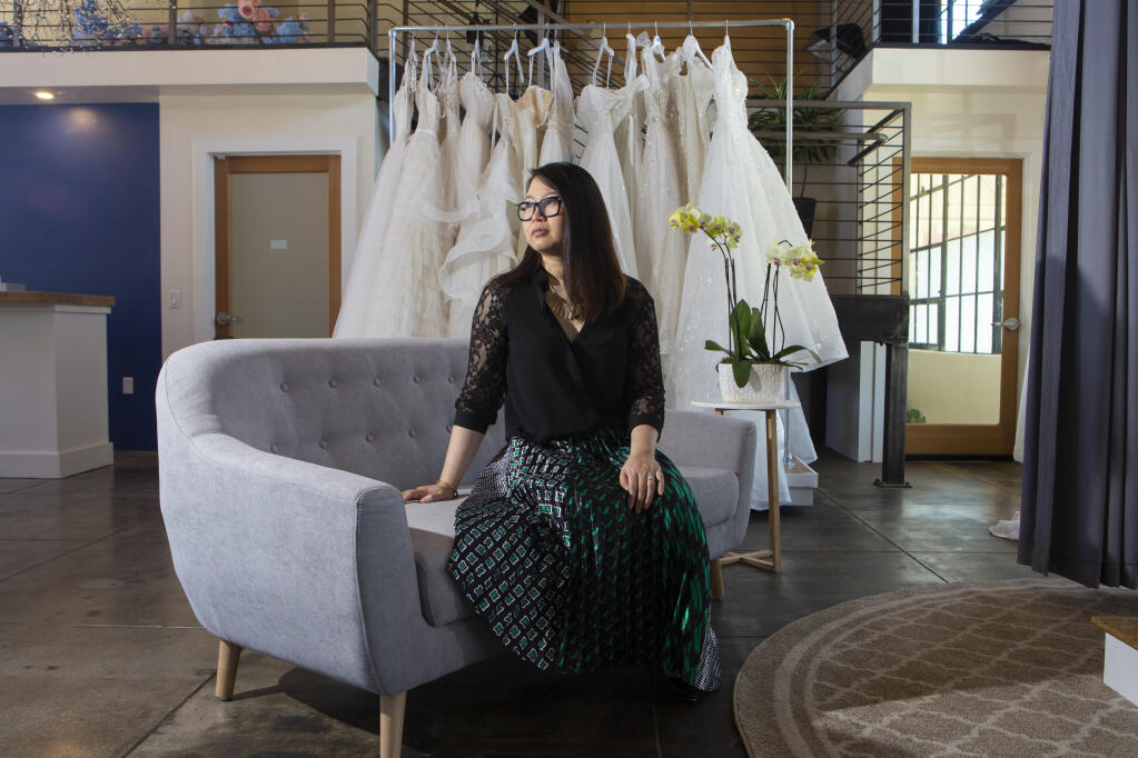 Hien Lee, of Dare & Dazzle on West Napa Street, is chalking up her first year renting bridal gowns as a wash. (Photo by Robbi Pengelly/Index-Tribune)