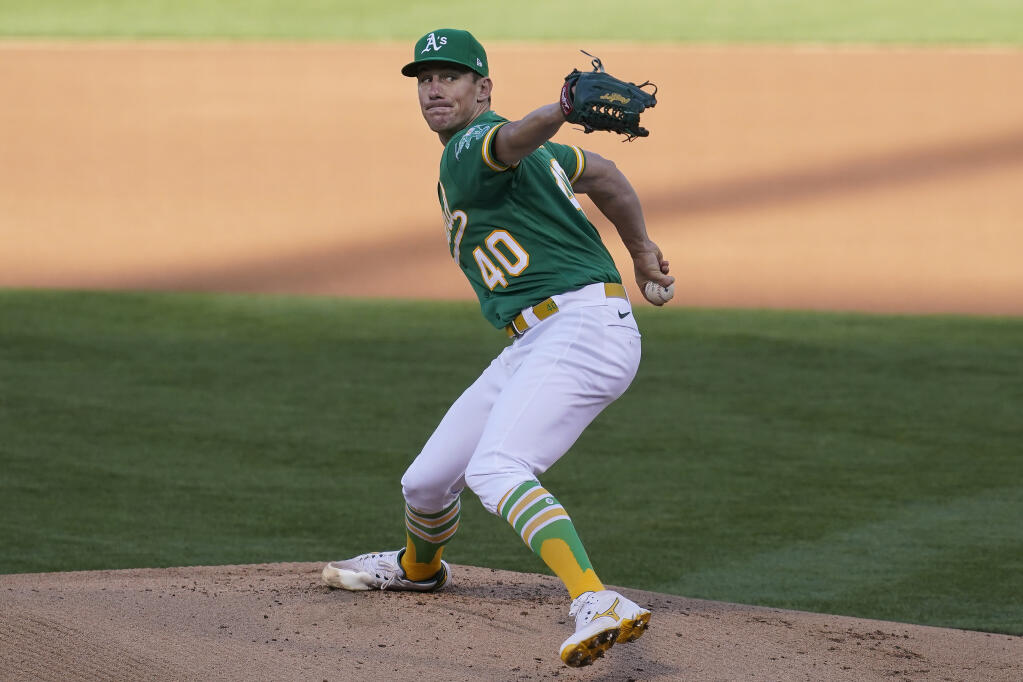 The Oakland Athletics’ Chris Bassitt pitches to a Los Angeles Angels batter during the first inning in Oakland, Thursday, May 27, 2021. (Jeff Chiu / ASSOCIATED PRESS)