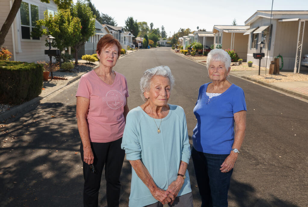 Residents of The Country Mobile Home Park in Santa Rosa, Jo Ann Jones, left, Joyce Amos, and Sue Wilson want rent control ordinance reduced and capped at a lower rate.  Photo taken Thursday, Oct. 20, 2022.  (Christopher Chung/The Press Democrat file)
