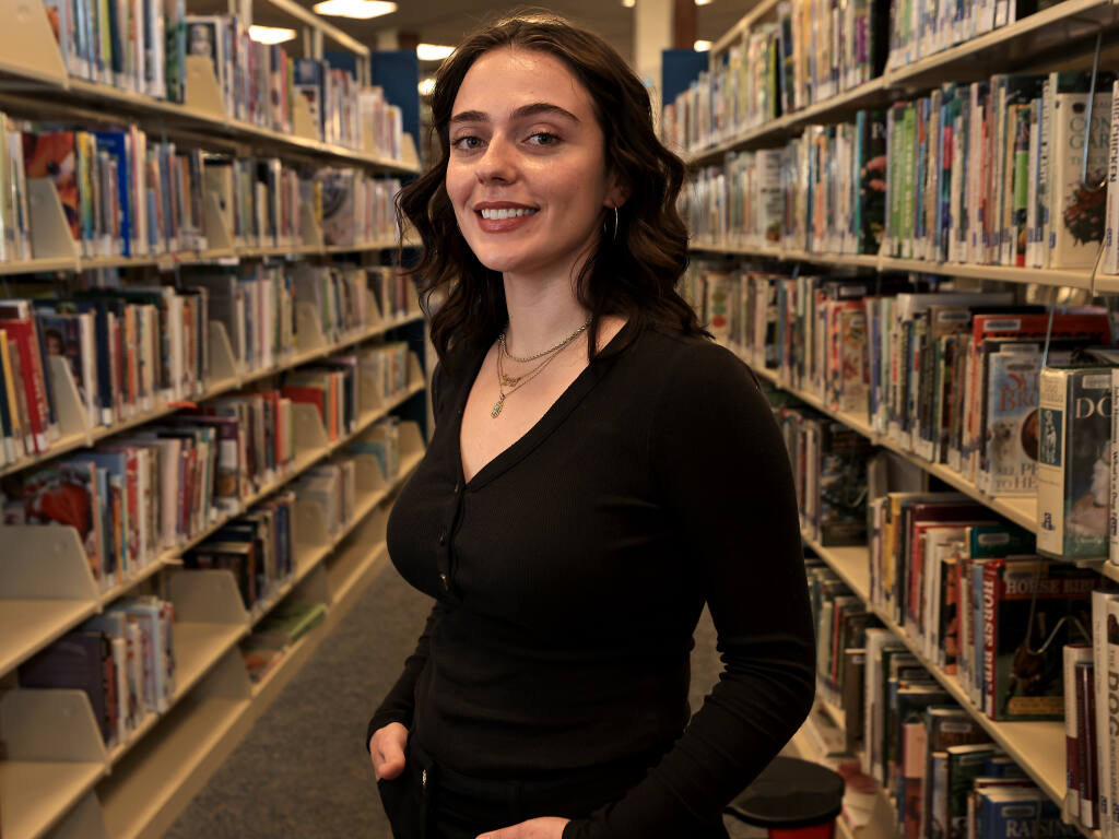 Santa Rosa Press Democrat public safety and criminal justice reporter Emily Wilder, Wednesday, Nov. 24, 2021 at the main branch of the Sonoma County Library in Santa Rosa. (Kent Porter / The Press Democrat)