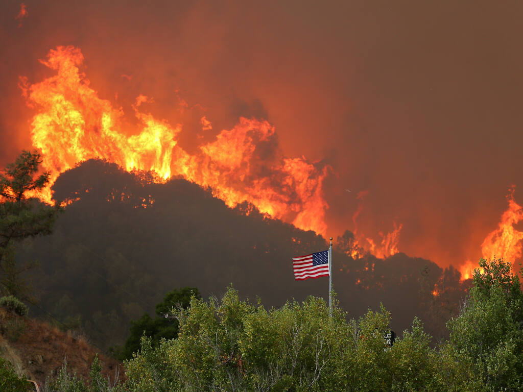 A hillside burns in Napa County during the Hennessey fire. (CHRISTOPHER CHUNG / The Press Democrat)