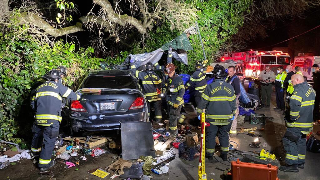 At least two people were injured late on Tuesday, March 23, 2021, after a vehicle plowed into a homeless encampment in southwest Santa Rosa. (Kent Porter / The Press Democrat)