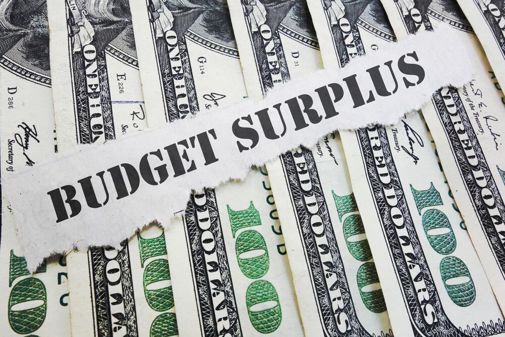 Budget Surplus message on hundred dollar bills