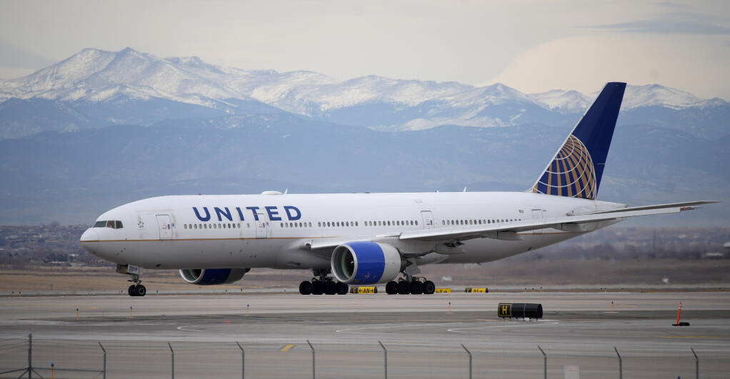 FILE - A United Airlines jetliner taxis to a runway for take off from Denver International Airport, Dec. 27, 2022. United Airlines reports earnings on Tuesday, April 18, 2023. (AP Photo/David Zalubowski, File)