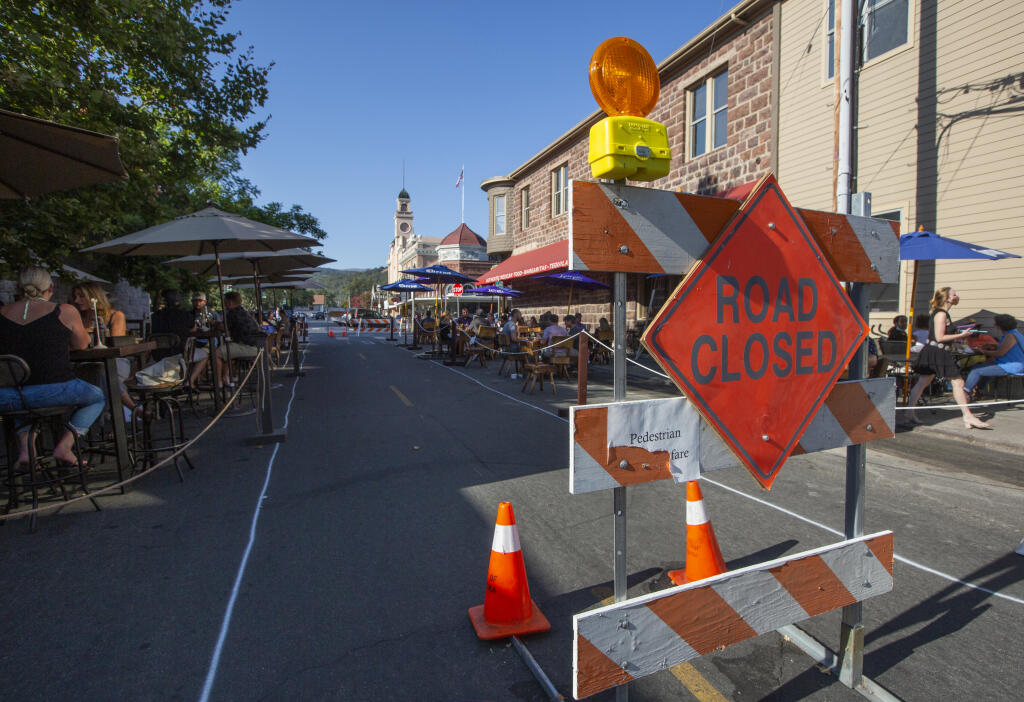 First Street East, between Maya Restaurant and Bar and Pangloss Cellars was closed to all but pedestrian and bicycle traffic to allow those two businesses to use some extra space for outside dining and wine tasting. (Photo by Robbi Pengelly/Index-Tribune)