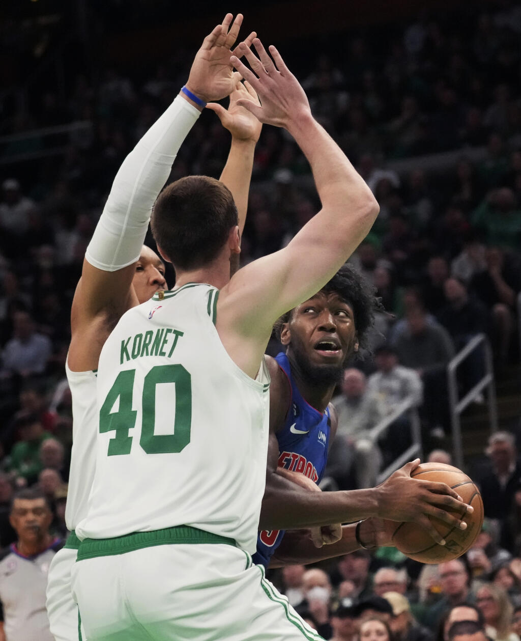 Detroit Pistons center James Wiseman, right, is trapped by Celtics center Luke Kornet on a drive to the basket during the first half of Wednesday’s game in Boston. (Charles Krupa / ASSOCIATED PRESS)