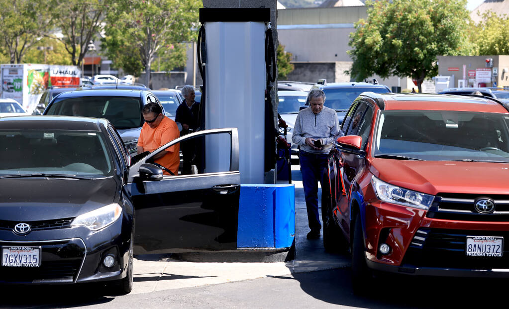 At Costco in Santa Rosa, customers take advantage of some of the lowest prices in town for fuel, Thursday, May 12, 2022.  (Kent Porter / The Press Democrat file)