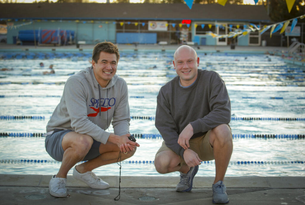 Petaluma’s Aquaducks are coached by (left) Nathan Adrian, a former Olympic swimmer and Jon Hiett. (right)_Tuesday, December 14, 2021._Petaluma, CA, USA._(CRISSY PASCUAL/ARGUS-COURIER STAFF)