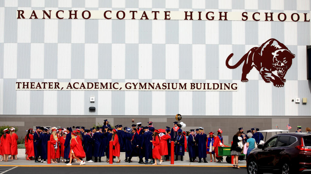 Seniors gather in front of Rancho Cotate High School prior to commencement exercises, Friday, June 3, 2022 in Rohnert Park. (Kent Porter / The Press Democrat) 2022