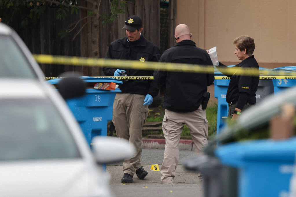 Sonoma County Sheriff's Office personnel investigate a scene on Peach Court in Santa Rosa after a man died in the custody of Santa Rosa police on Nov. 18, 2021. (Christopher Chung / The Press Democrat)