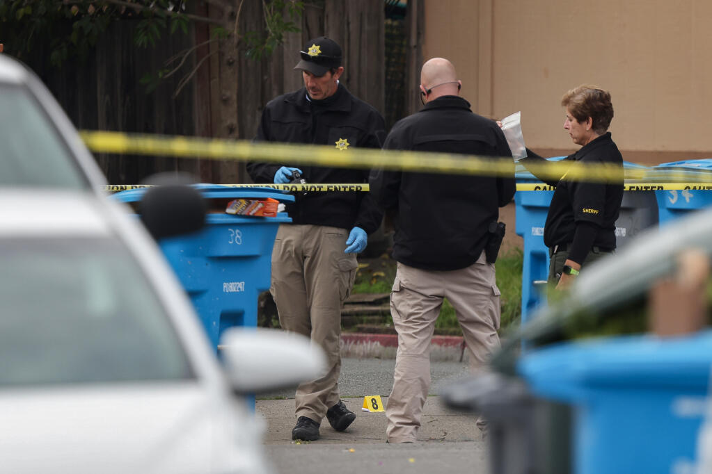 Sonoma County Sheriff's Office personnel investigate a scene on Peach Court in Santa Rosa after a man died in the custody of Santa Rosa police on Nov. 18, 2021. (Christopher Chung / The Press Democrat)