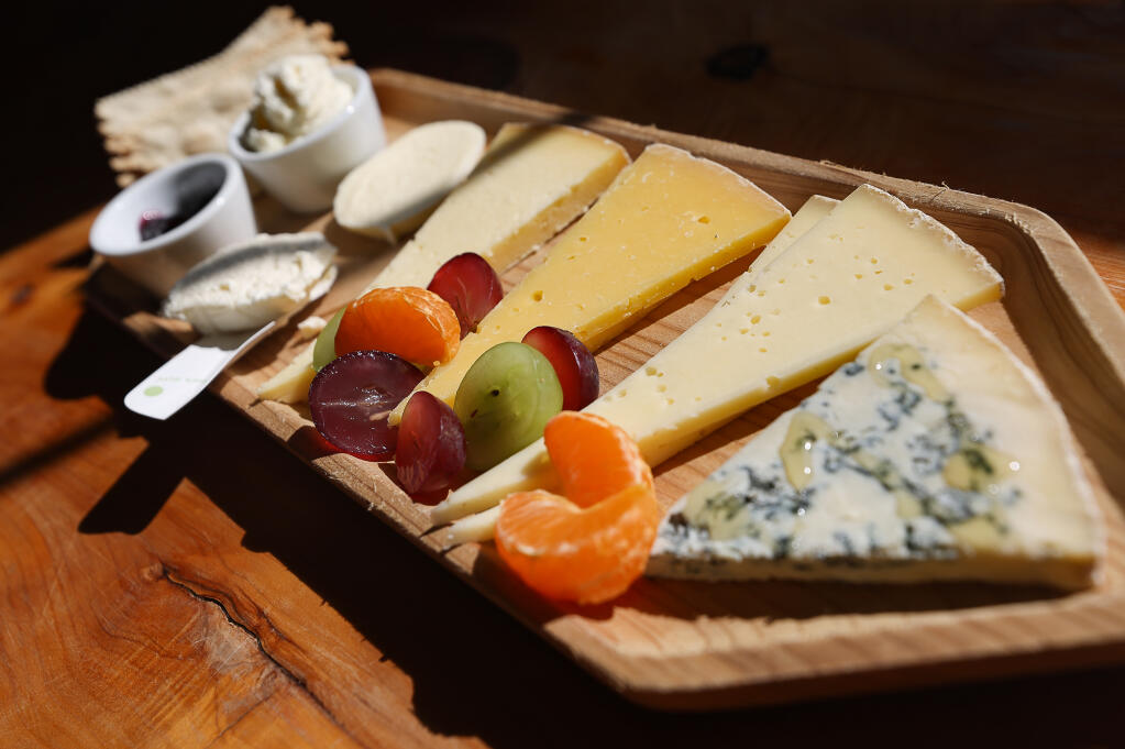 A cheese flight at Valley Ford Cheese & Creamery includes Grazin’ Girl gorgonzola, Estero Gold, Estero Gold Reserve, Highway 1 Fontina, fresh mozzarella, fresh ricotta, and plain farmer’s cheese, in Valley Ford on Wednesday, March 13, 2024.  (Christopher Chung / The Press Democrat)