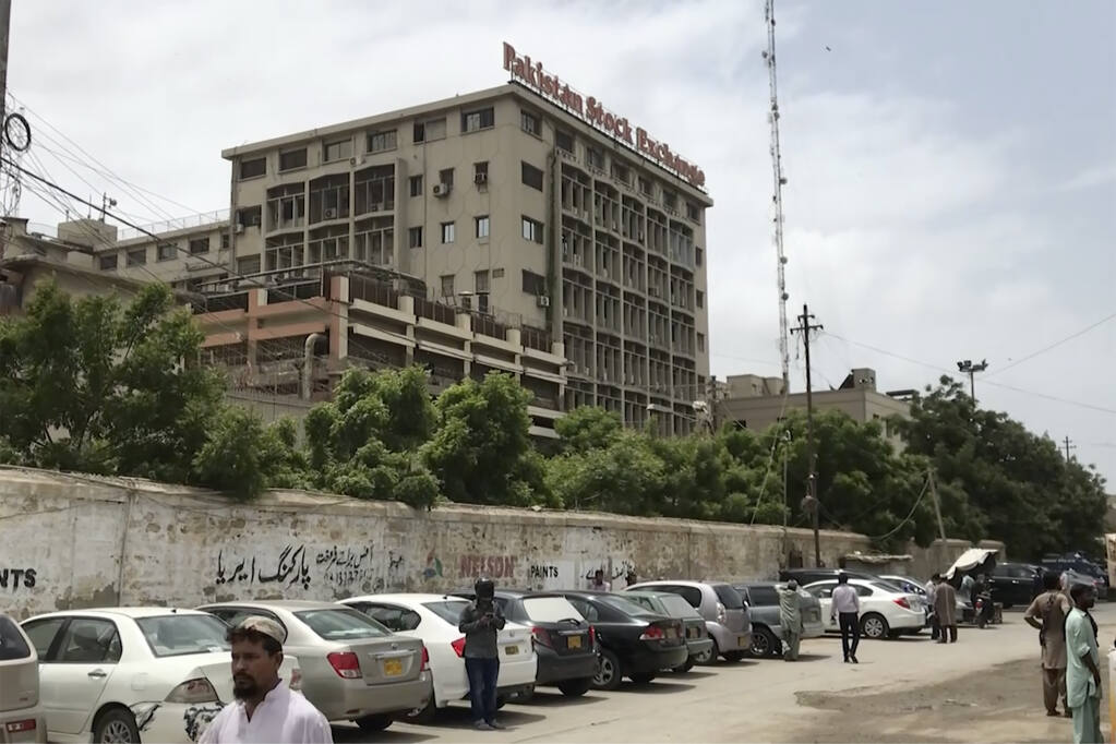 This image made from a video shows the exterior of stock exchange building in Karachi, Pakistan Monday, June 29, 2020. Militants attacked the stock exchange in the Pakistani city of Karachi on Monday, according to police. (AP Photo)