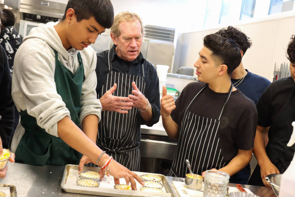 Teacher Jonathan Beard aids students in Sonoma Valley High School's culinary program on Tuesday, Oct. 18, 2022. (Liberty Olhava/for the Index-Tribune)