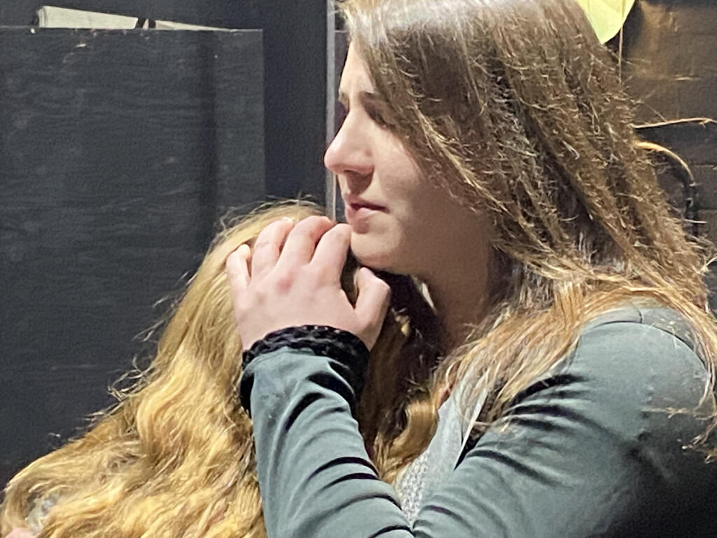 Savannah Chevalier-Welch, left, and Kate Edery appear in the new Raven Players production about school shootings. (Steven Martin)