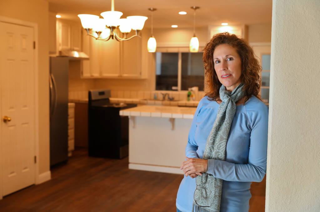 Property owner Jennifer Coleman is concerned about how possible county regulations will harm both landlords and tenants.  (Christopher Chung/ The Press Democrat)