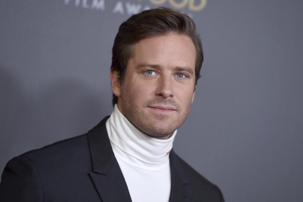 FILE - Armie Hammer appears at the Hollywood Film Awards in Beverly Hills, Calif., on Nov. 4, 2018. Hammer will not be charged after a long investigation of a woman's allegation that he sexually assaulted her in 2017, Los Angeles prosecutors said. (Photo by Jordan Strauss/Invision/AP, File)