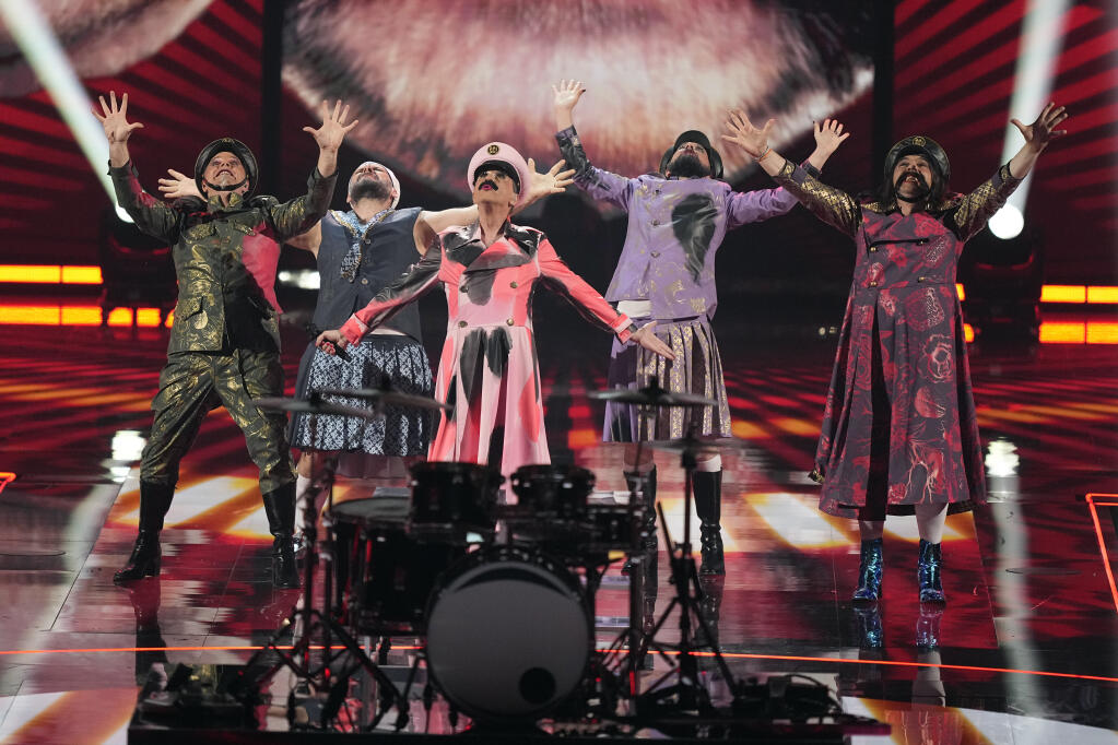 Let 3 of Croatia performs during the Grand Final of the Eurovision Song Contest in Liverpool, England, Saturday, May 13, 2023. (AP Photo/Martin Meissner)