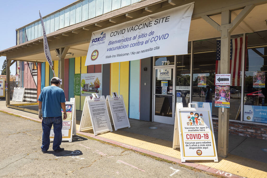 While some COVID services will be curtailed as Sonoma County moves to a new phase of managing the pandemic, the vaccination site in Roseland is expected to remain open through September. (John Burgess / The Press Democrat)