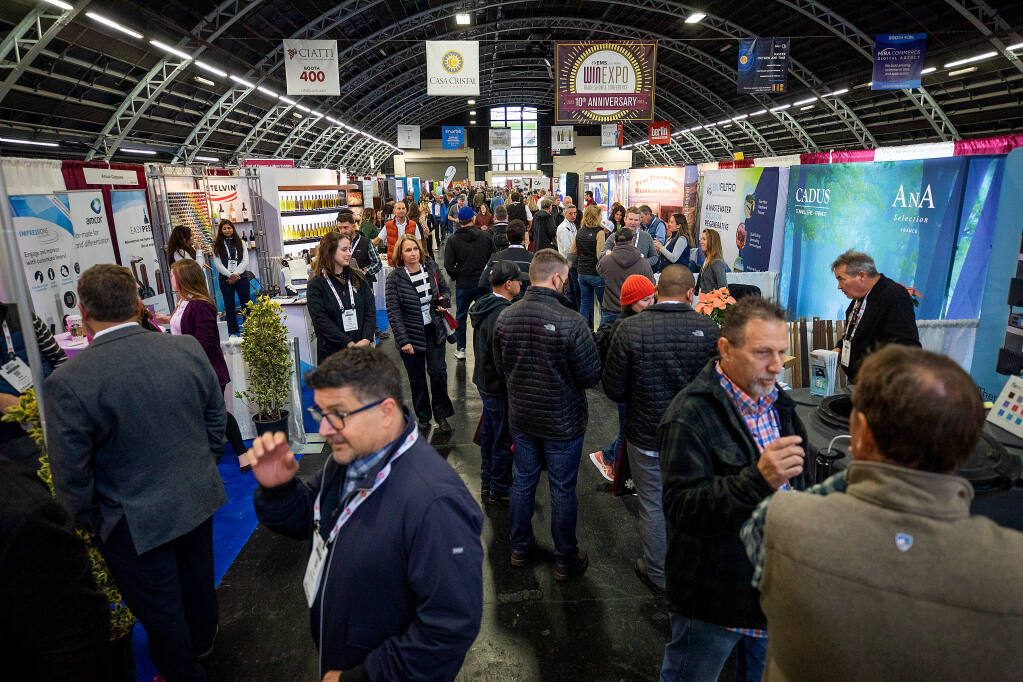 Industry suppliers and service providers filled the halls of the Sonoma County fairgrounds for the 10th Annual North Coast Wine Industry Expo, Conference & Trade Show in Santa Rosa Thursday, December 1, 2022.  (John Burgess/Press Democrat)