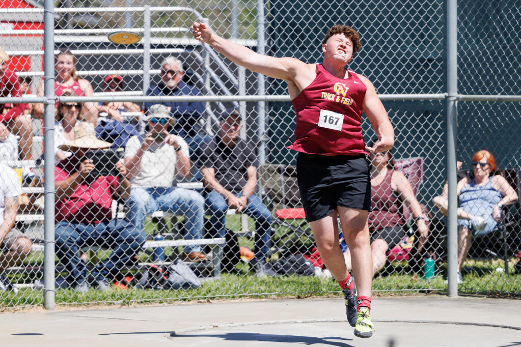 Cardinal Newman’s Jake Joerger throws the discus during the Viking Classic at Montgomery High School in Santa Rosa. (Abraham Fuentes/For The Press Democrat)