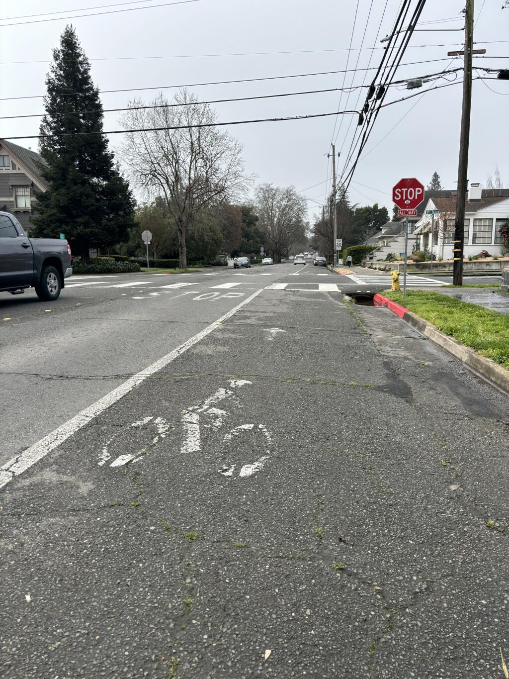The current bike lane on D Street at 8th Street in west Petaluma is shared with street parking. Photographed on Thursday, February 22, 2024. (JENNIFER SAWHNEY/ARGUS-COURIER STAFF)