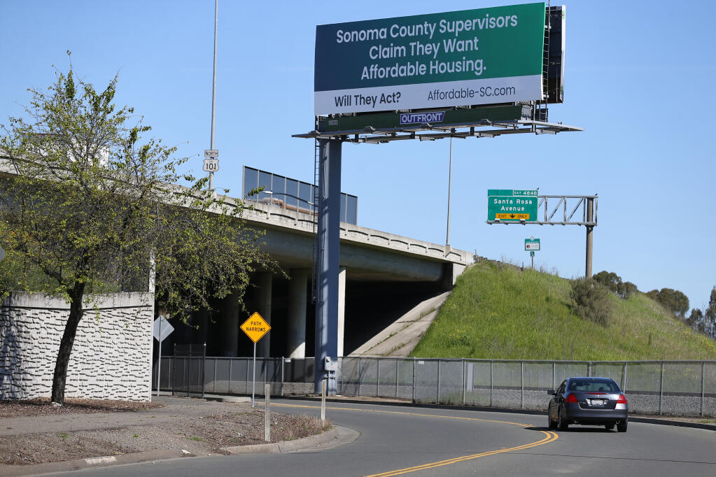 A billboard challenging Sonoma County supervisors’ commitment to creating affordable housing is pictured on Tuesday, March 26, 2024. It was recently taken down. (Christopher Chung / The Press Democrat)