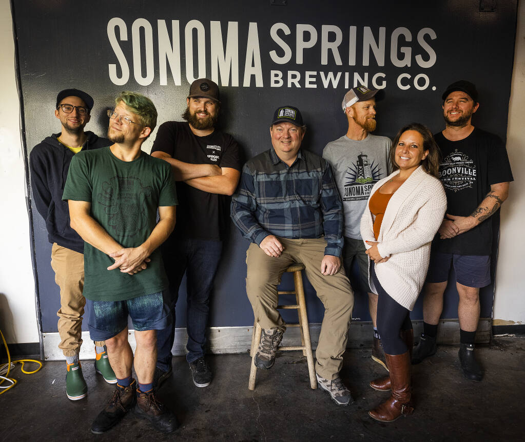 Robert Raney, co-owner of Sonoma Springs Brewing Co., center, with the employees of his Sonoma business Monday, September 19, 2022. Raney set up a 401(k) plan for employees this summer after employees asked the small business owner for one.  (John Burgess/The Press Democrat)
