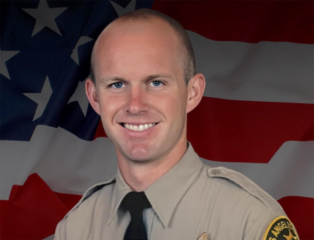 This undated photo provided by Los Angeles County Sheriff’s Department shows its Deputy Ryan Clinkunbroomer. The Los Angeles County Sheriff's Department deputy died after he was shot in his patrol car Saturday evening, Sept. 16, 2023, by an unknown assailant and an investigation is underway that the sheriff said will press all of the department’s resources into action.(Los Angeles County Sheriff’s Department via AP)