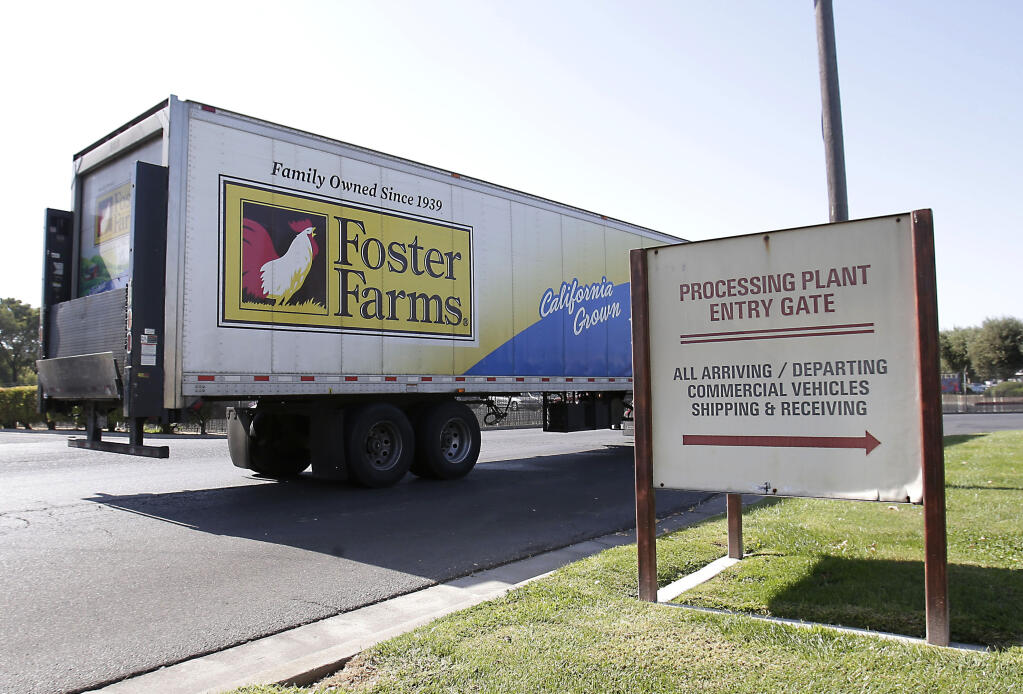 FILE - This Oct. 10, 2013 file photo shows a truck entering the Foster Farms processing plant in Livingston, Calif.  (AP Photo/Rich Pedroncelli, File)