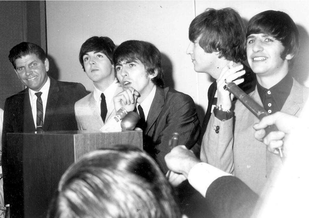 Bill Soberanes, left, photo-bombed the Beatles at their press conference in San Francisco in 1964. (ARGUS-COURIER FILE)