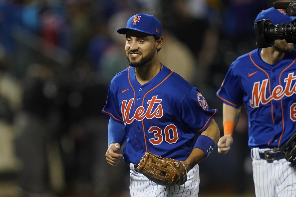 The Mets’ Michael Conforto smiles after a 2021 game against the Miami Marlins in New York. (Frank Franklin II / ASSOCIATED PRESS)
