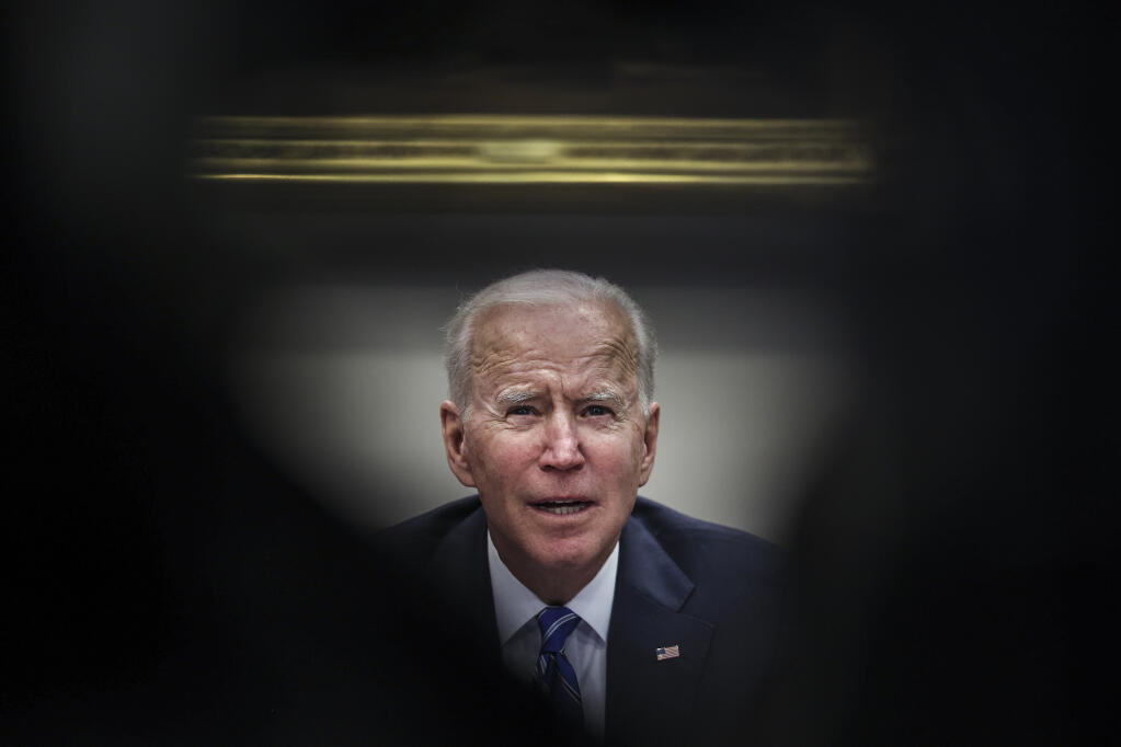 President Joe Biden has maintained a lower profile than his predecessor while offering a much more ambitious menu of proposals. (OLIVER CONTRERAS / New York Times)
