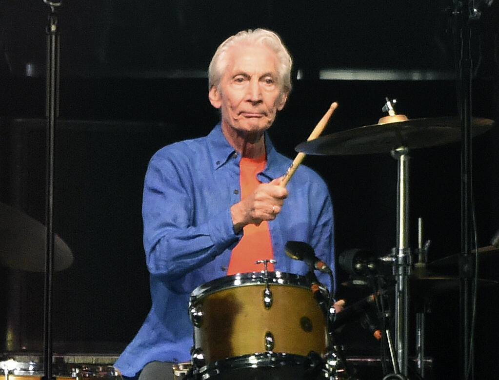 Rolling Stones drummer Charlie Watts, right, performs behind singer Mick Jagger during their concert at the Rose Bowl, Thursday, Aug. 22, 2019, in Pasadena, Calif. Watts died in London today at age 80. (AP Photo/Chris Pizzello)