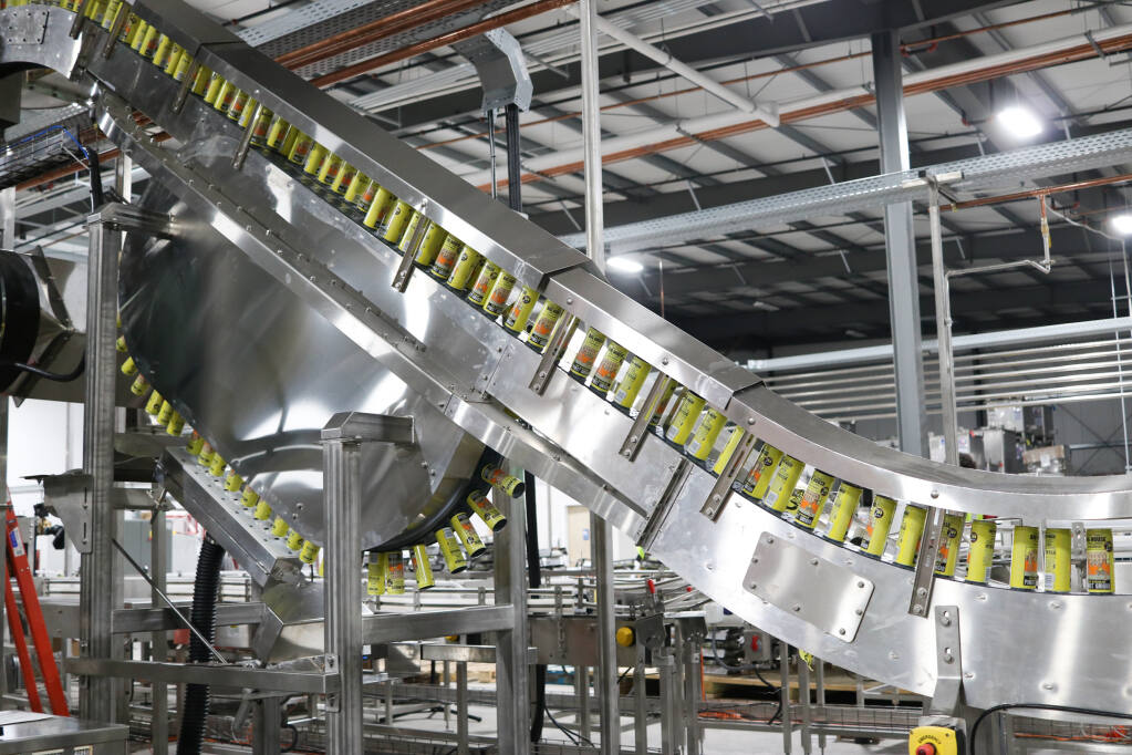 Cans of wine move through the high-speed filling line in Free Flow Wines' Sonoma production facility on June 28, 2019. (courtesy of Free Flow Wines)
