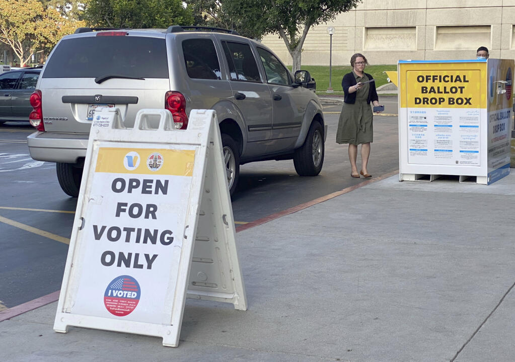 A voter drives up and drops off their ballot during Election Night at the L.A. County's Registrar-Recorder in Norwalk on Tuesday, November 3, 2020. (Photo by Keith Birmingham, Pasadena Star-News/ SCNG)