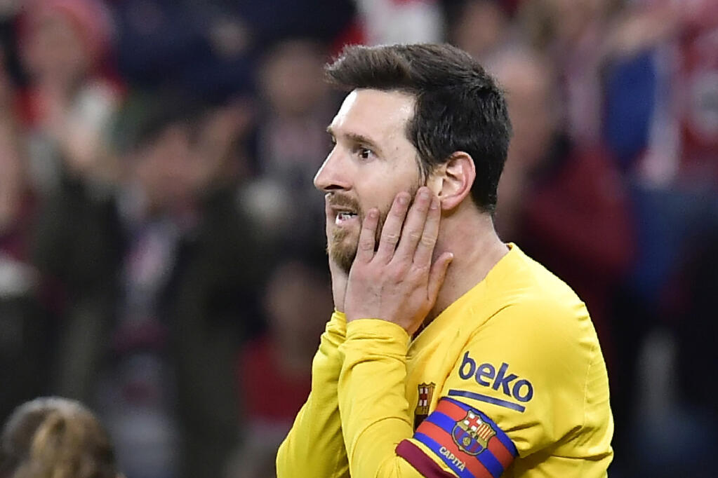 In this Feb. 6, 2020 file photo, Barcelona’s Lionel Messi reacts during the Spanish Copa del Rey quarterfinal game against Athletic Bilbao at the San Mames stadium in Bilbao, Spain. (Alvaro Barrientos / ASSOCIATED PRESS)