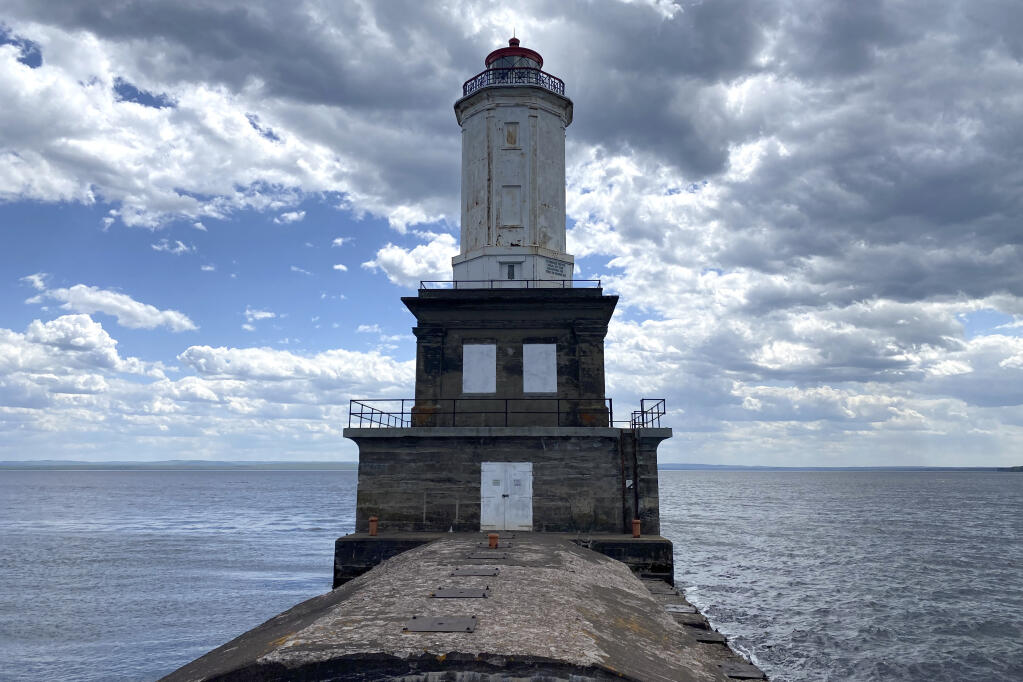 The Keweenaw Waterway Lower Entrance Light stands in Keweenaw Bay, June 2, 2022, in Chassell, Mich. The federal government's annual effort to give away or sell lighthouses that are no longer needed for navigation purposes includes 10 lighthouses this year. (Luke Barrett/General Services Administration via AP)