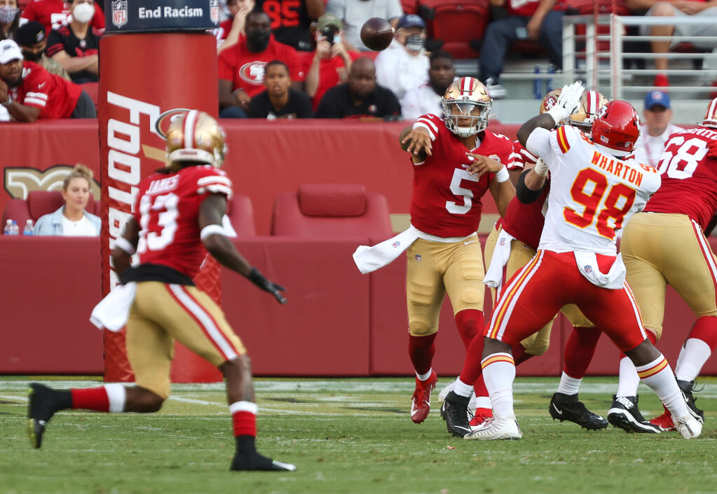 San Francisco 49ers quarterback Trey Lance attempts to connect with wide receiver Richie James during their game at Levi’s Stadium in Santa Clara on Saturday, Aug. 14, 2021.  (Christopher Chung / The Press Democrat)