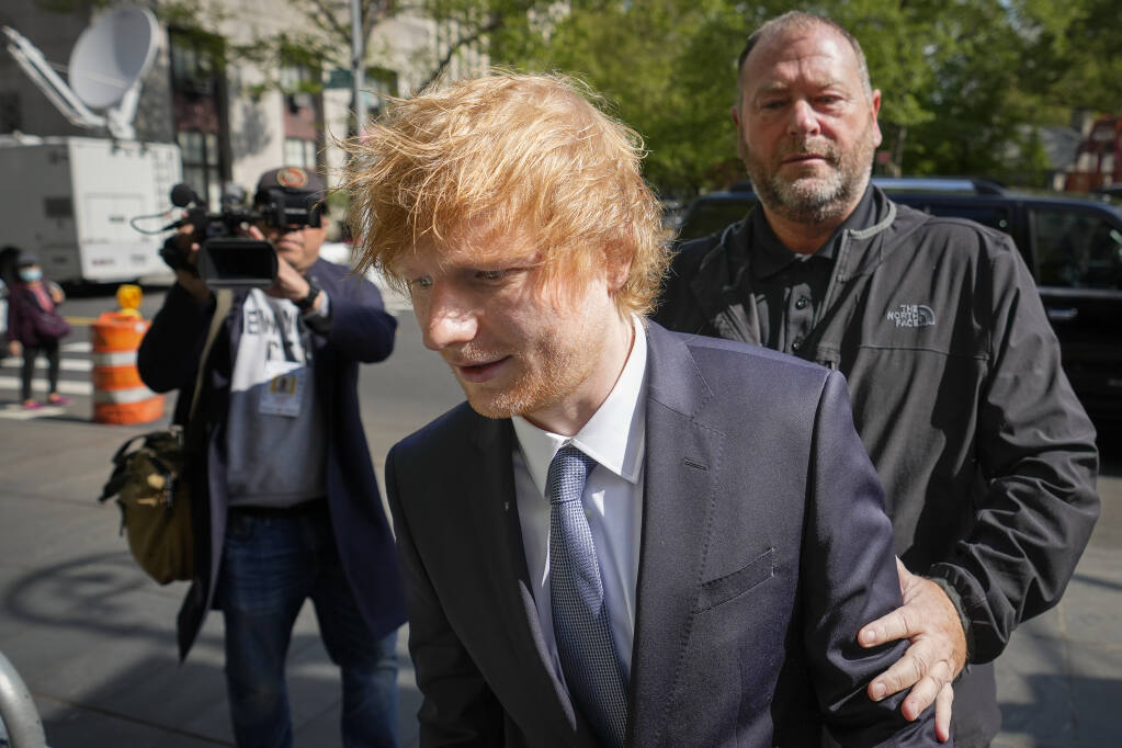 Recording artist Ed Sheeran arrives to Manhattan federal court Manhattan federal court, Wednesday, April 26, 2023, in New York. The heirs of Ed Townsend, Marvin Gaye's co-writer of the 1973 soul classic, sued Sheeran, alleging the English pop star's hit 2014 tune has "striking similarities" to "Let's Get It On" and "overt common elements" that violate their copyright.   (AP Photo/John Minchillo)